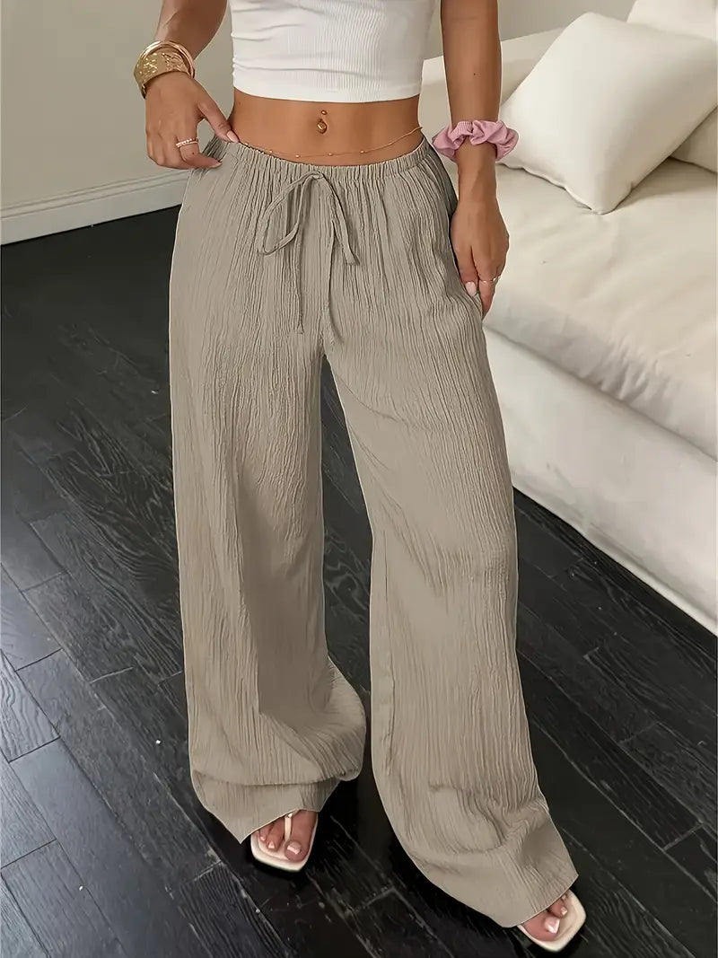 Elegantes pantalones de pierna ancha.