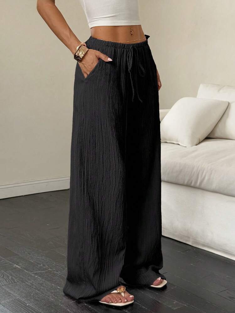 Elegantes pantalones de pierna ancha.