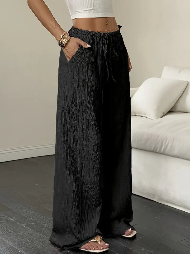 Elegantes pantalones de pierna ancha.