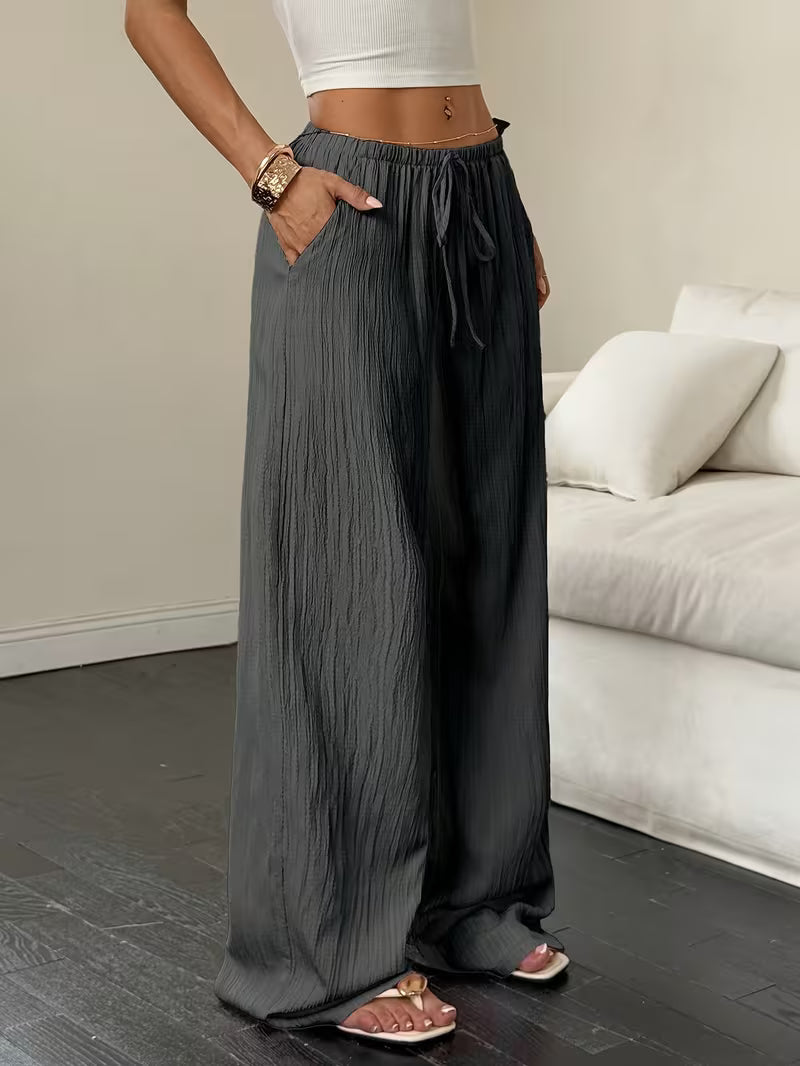 Elegantes pantalones de pierna ancha.