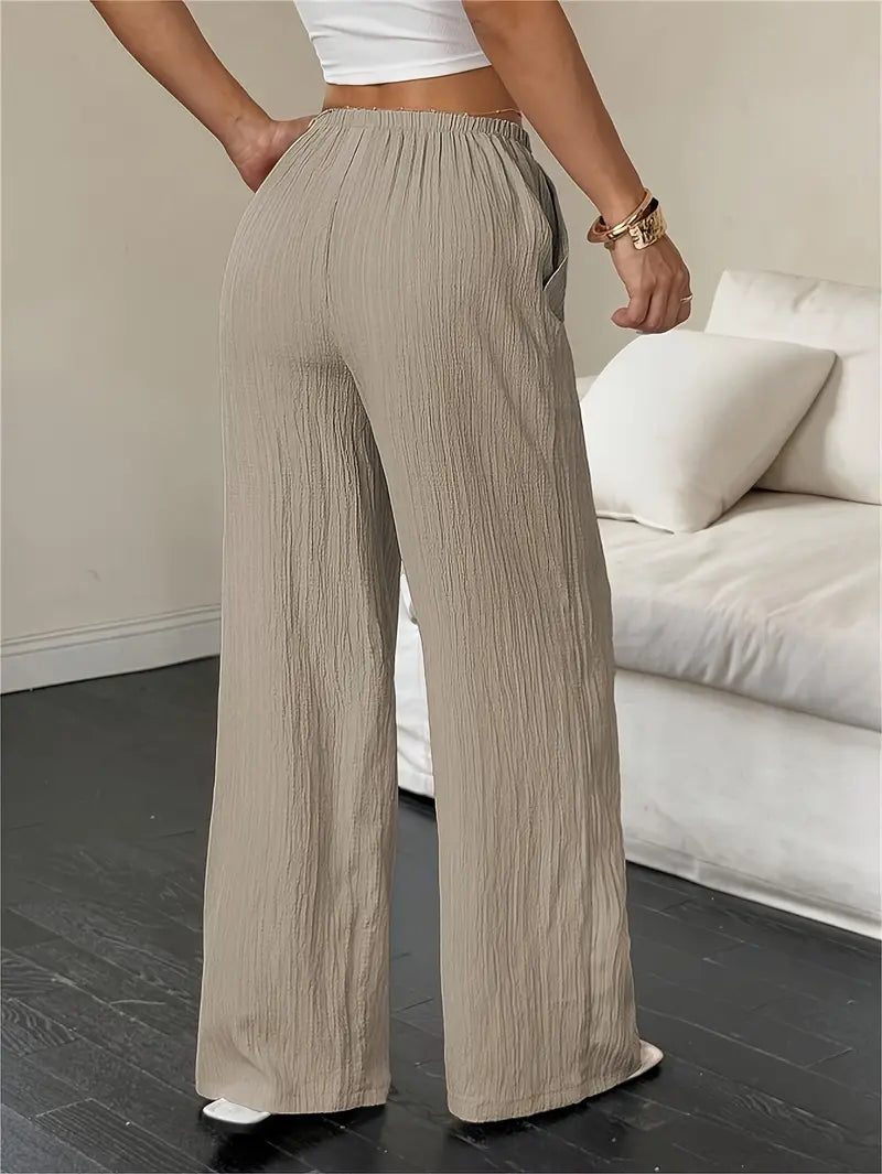 Elegantes pantalones de pierna ancha.