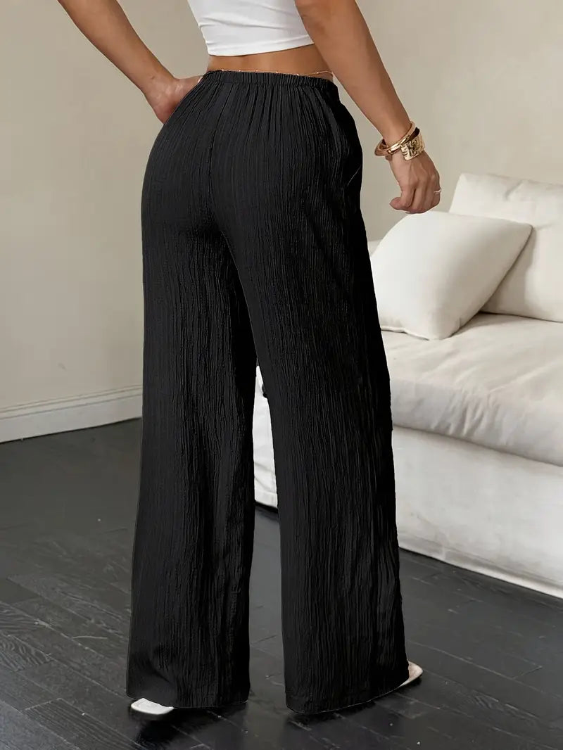 Elegantes pantalones de pierna ancha.