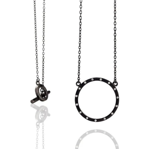 Collar Cosmos en plata oxidada con brillantes