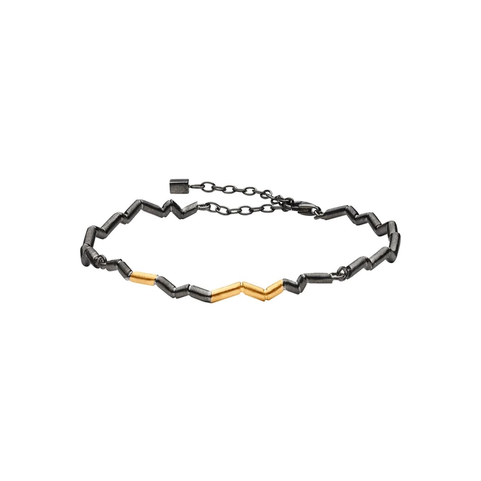 Pulsera Momentum chapada en rodio negro con detalles dorados