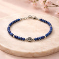 Pulsera unisex con bolitas azules