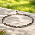 Pulsera Momentum en plata rodiada negra 925