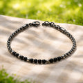 Pulsera unisex con pequeñas bolas negras